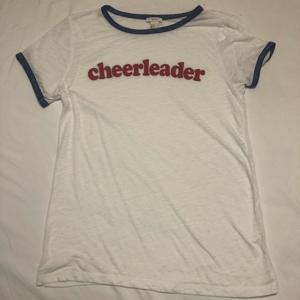White T-shirt w/ blue boarder & cheerleader in red